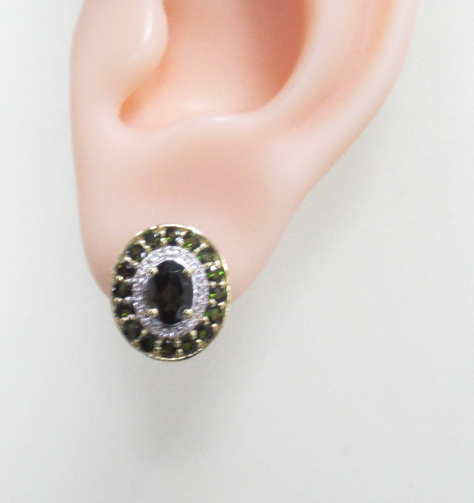 Серебряные серьги 925 пробы; вставки 34 Турмалин зеленый 2,78 ct; 52 Топаз белый 0,13 ct;